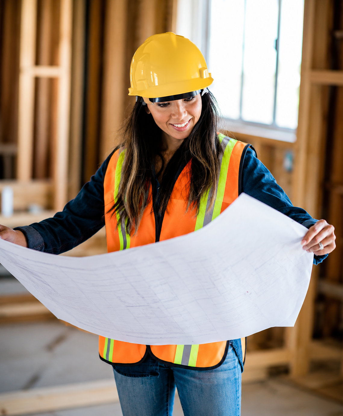 Construction engineer with blueprints